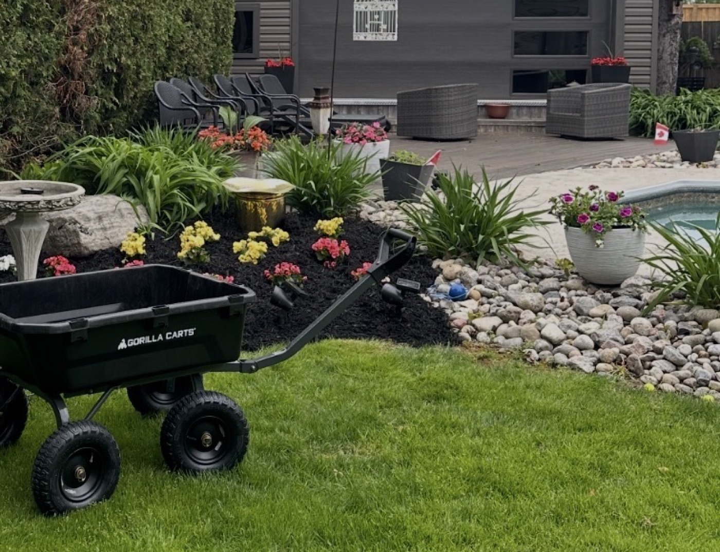Freshly mulched garden bed with flowers