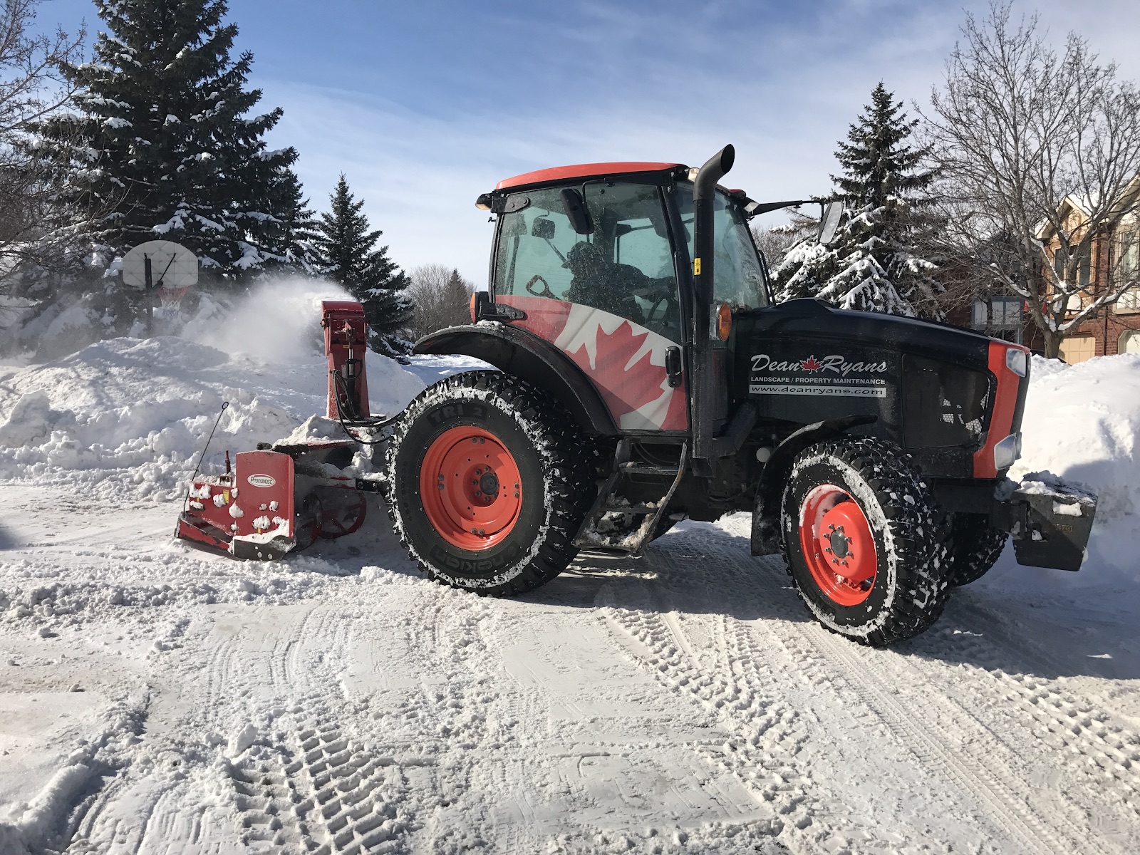 Dean Ryans tractor clearing a snowy street
