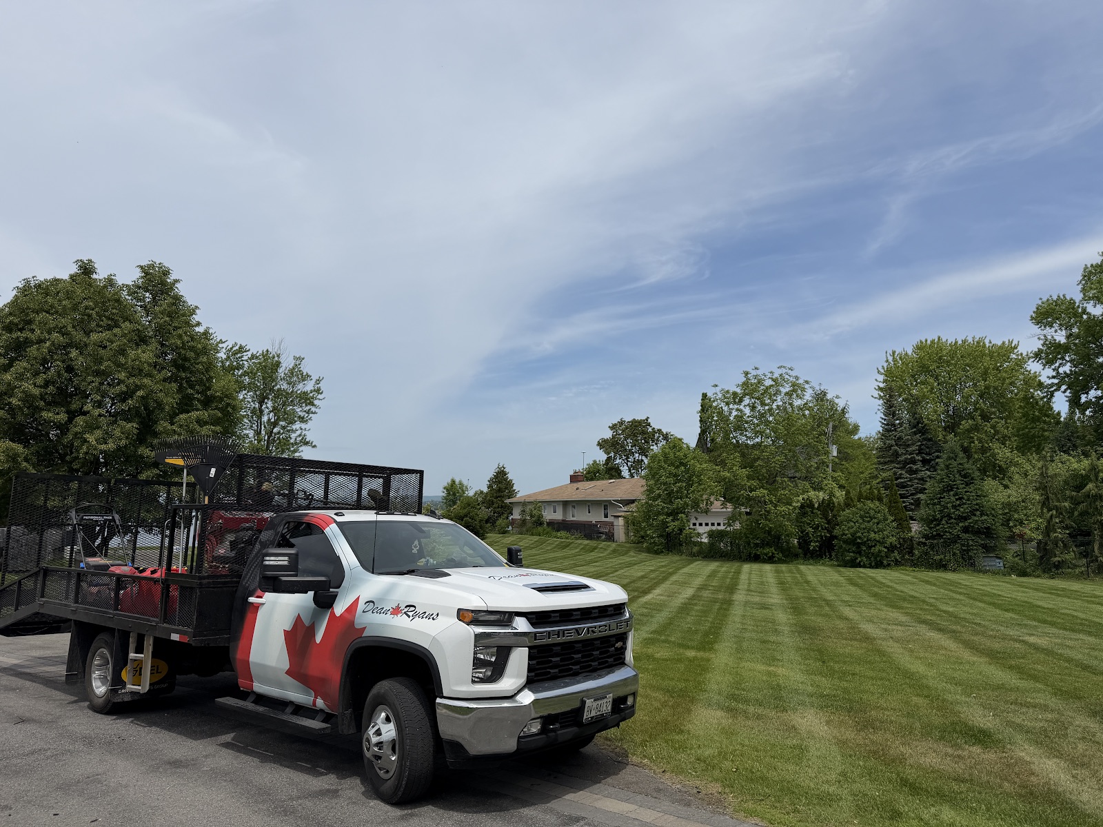 Dean Ryans branded truck on a maintained property